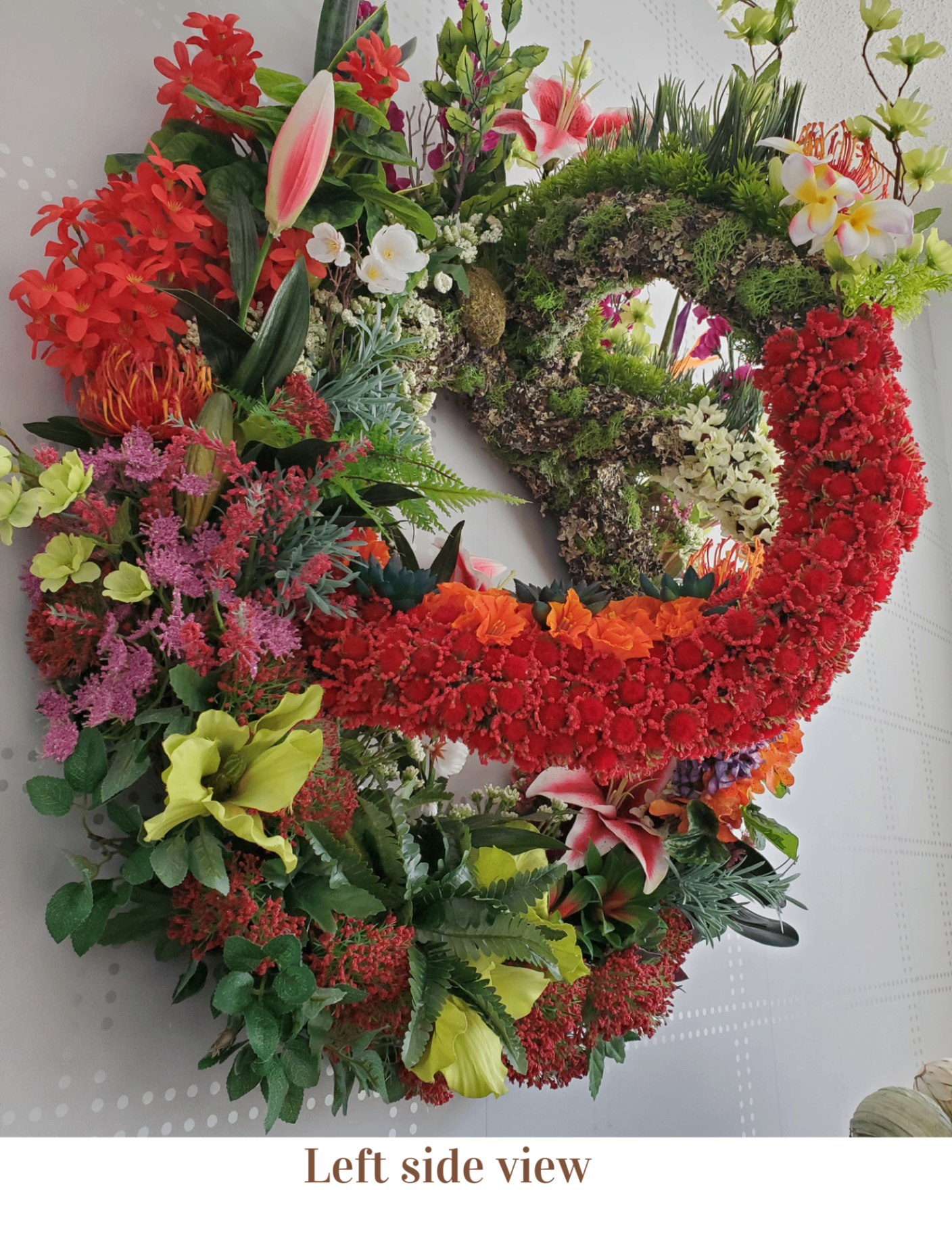 Biosphere Dome Wreath® left side view showing dimensional botanical protrusion
